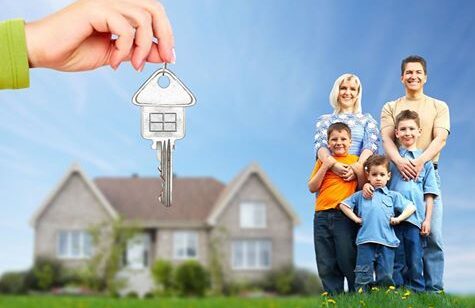 a hand holding a key to a house Top 5 Affordable Locations to Buy Residential Plots Near Chennai